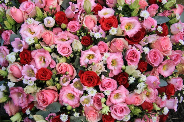 Red, pink and white wedding arrangement