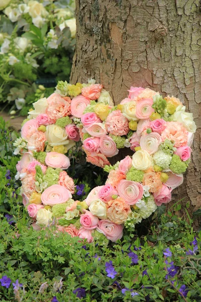 Heart shaped sympathy flowers