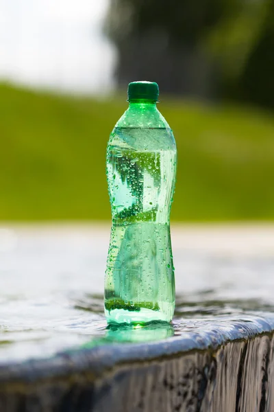 Green plastic bottle