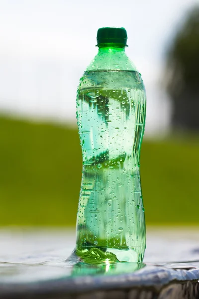 Water in green bottle