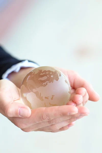 Glass ball in  hand