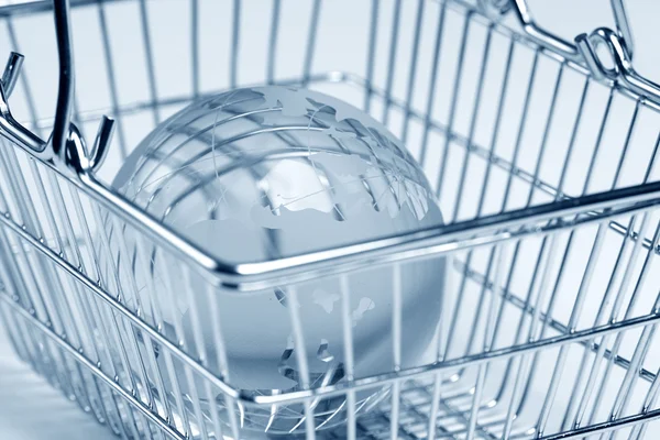 Glass globe in the shopping basket