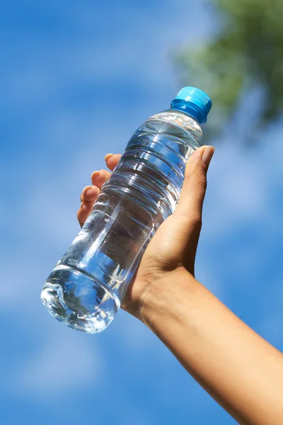 Woman with bottle of water