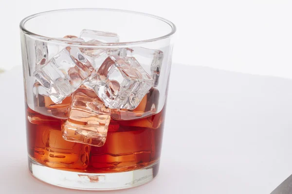 Whiskey with ice cubes