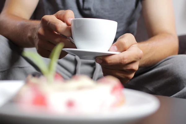 Cup of coffee in hands