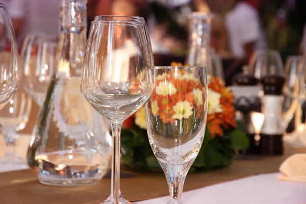 Wineglasses setting on the arranged table in the restaurant