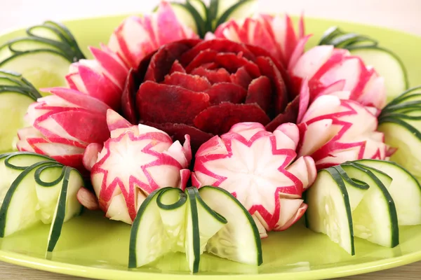 Cucumber beet and radish decorated salad like flower