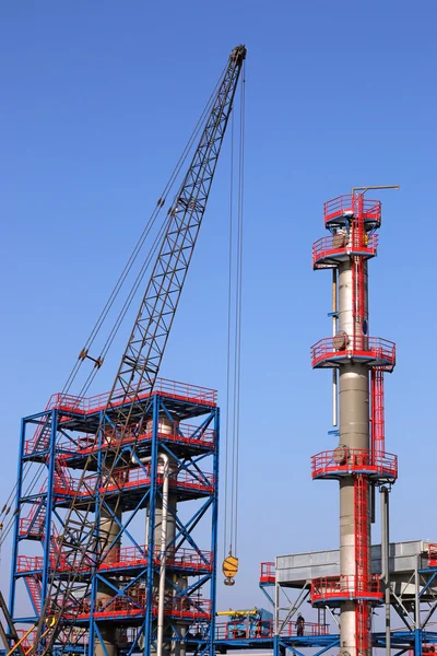 New refinery construction site with crane