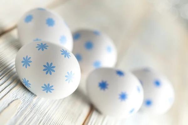 Easter symbols - White eggs with blue pattern