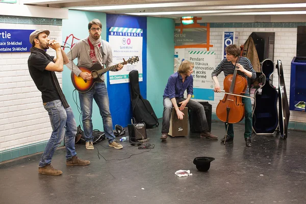 Musicians busking in the Paris Metro