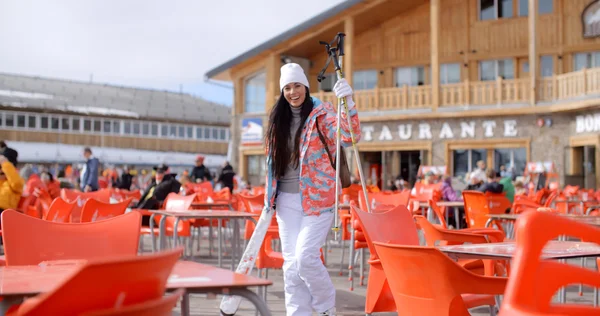 Woman posing at ski resort restaurant