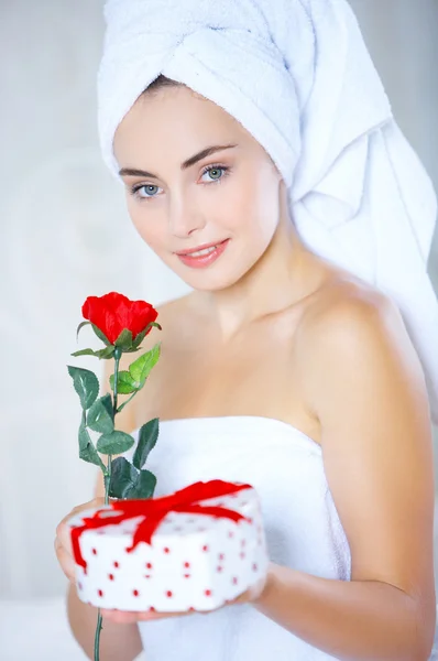 Woman Holding Rose and Presents