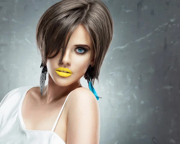 Woman face with short hair, yellow lips