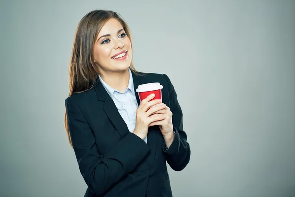 Businesswoman holds cup of drink