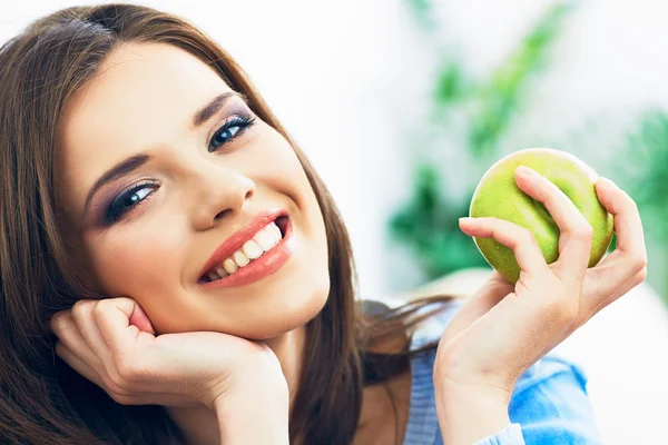 Woman with green apple