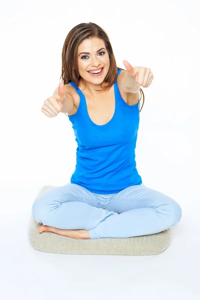 Woman sitting in lotus pose