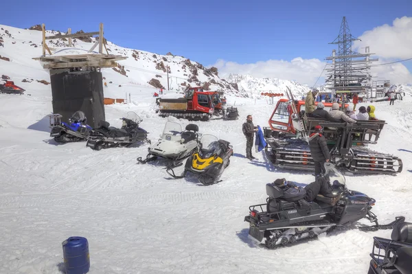 Snowmobiles on the slope of mountain Elbrus