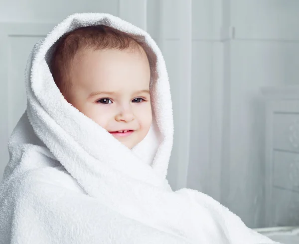 Baby with a towel