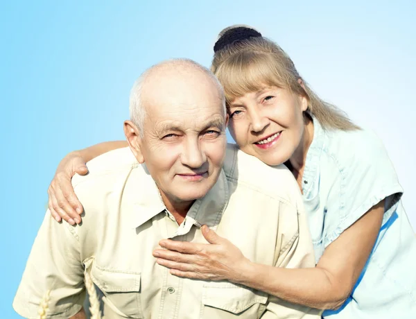 Happy elderly couple isolated