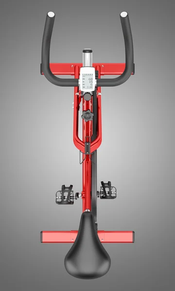 Top view of stationary exercise bike isolated on gray background