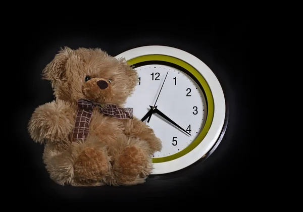 Toy - a little bear and clock
