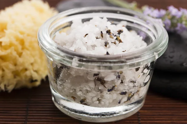 Homemade skin exfoliant (skin scrub) of sea salt, olive oil and