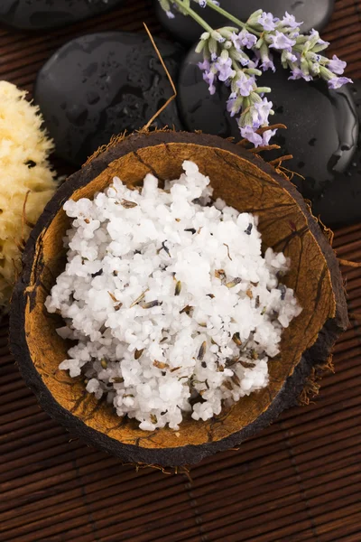 Homemade skin exfoliant (skin scrub) of sea salt, olive oil and