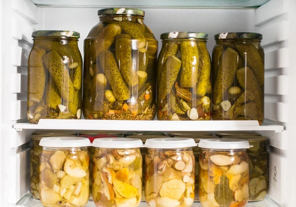 Refrigerator full of cucumber preserves