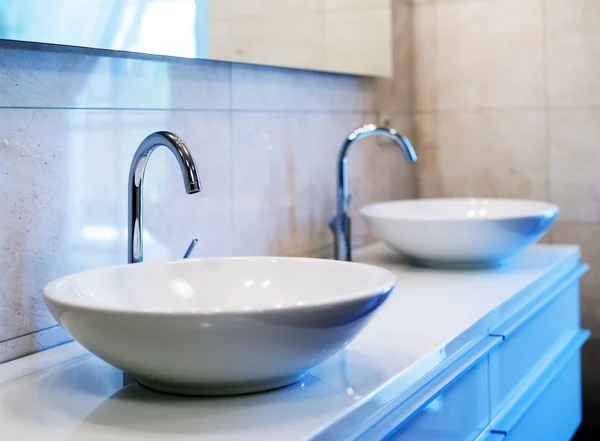 Closeup of water-supply faucet in modern bathroom