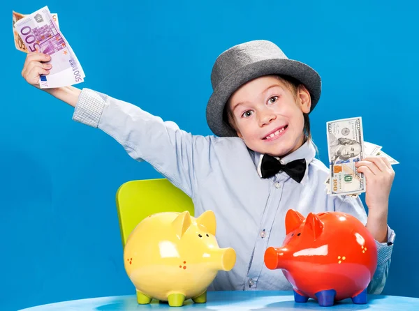 Little businessman counting money