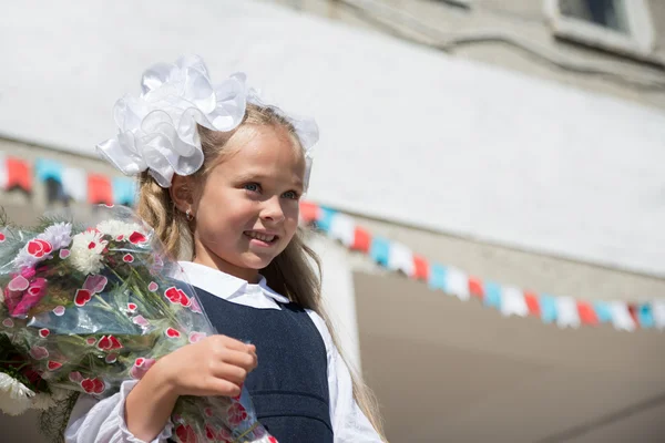 Little girl for the first time in school