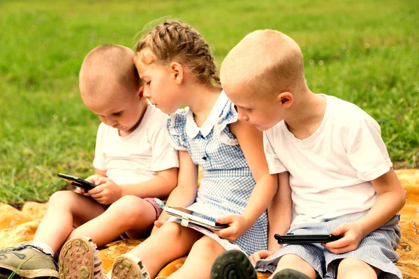 Children using smartphones