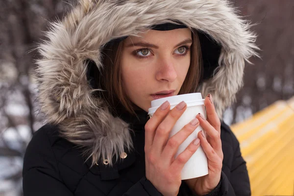 Winter, woman and hot beverage