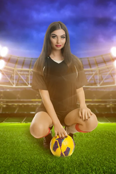 Woman soccer player on stadium