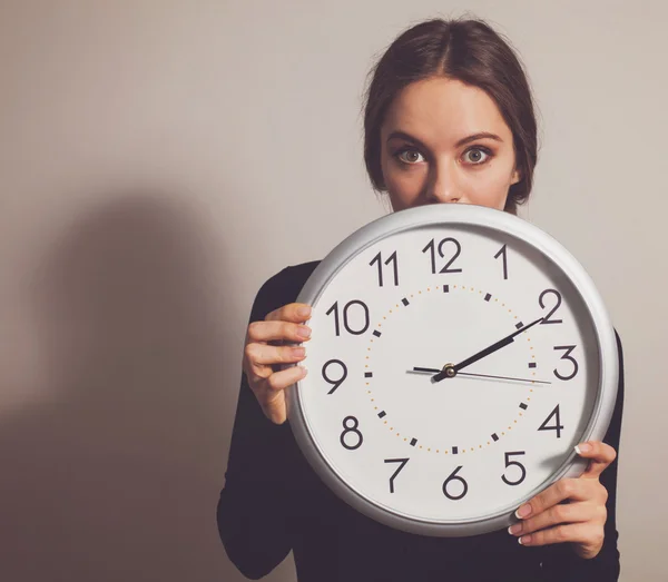 Woman with clock