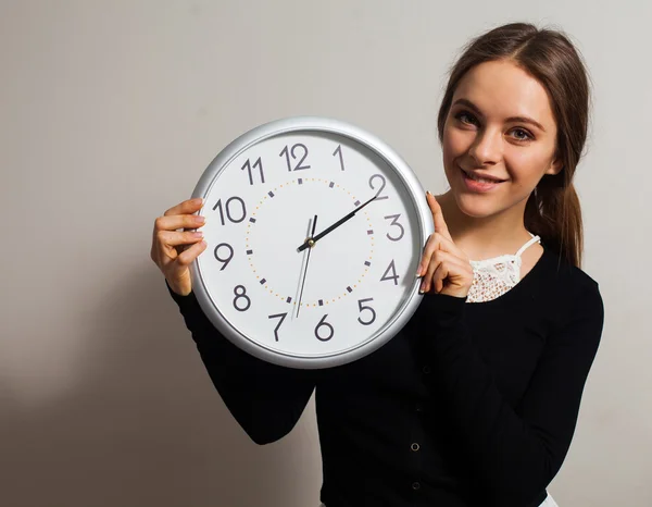 Woman with clock