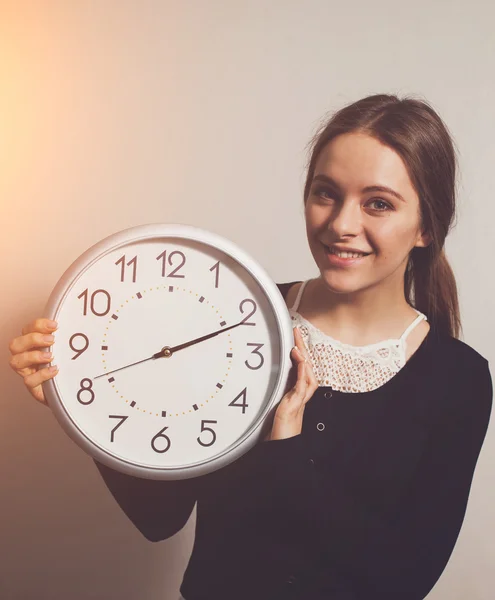 Woman with clock