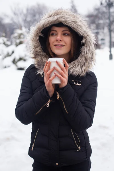 Winter, woman and hot beverage