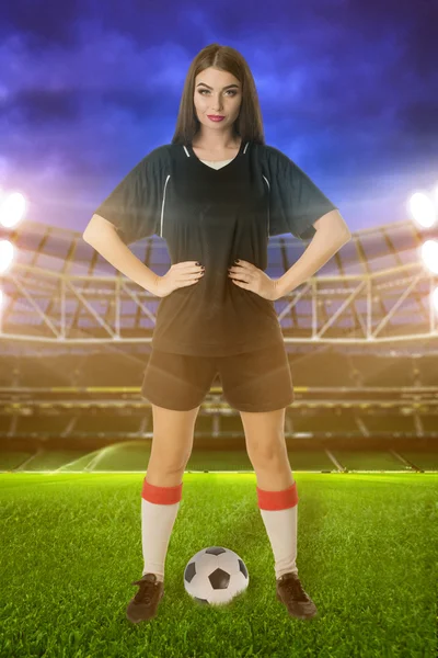 Woman soccer player on stadium