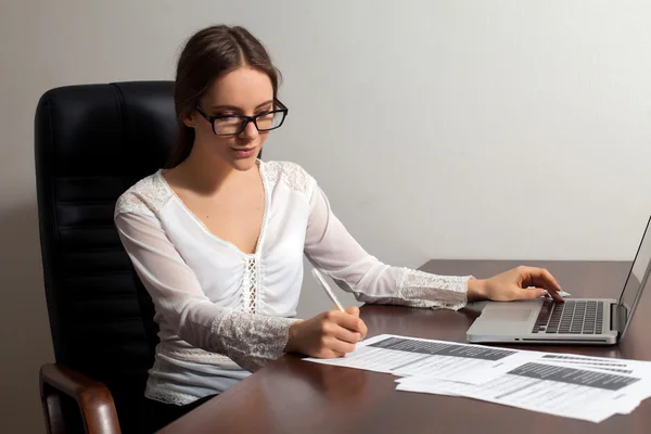 Woman boss works in the office