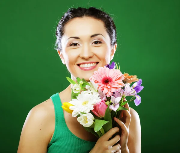Young asian woman with bouquet flowers