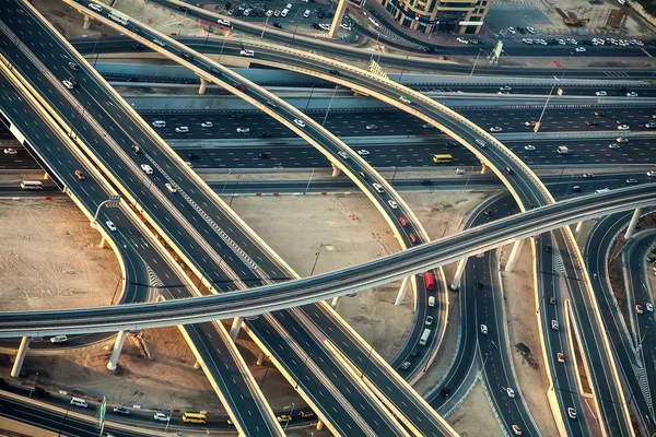 Highway road intersections with traffic in a big city (Dubai)