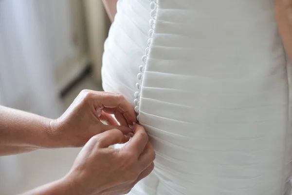 Garter on the leg of a bride, Wedding day moments