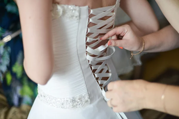 Garter on the leg of a bride, Wedding day moments