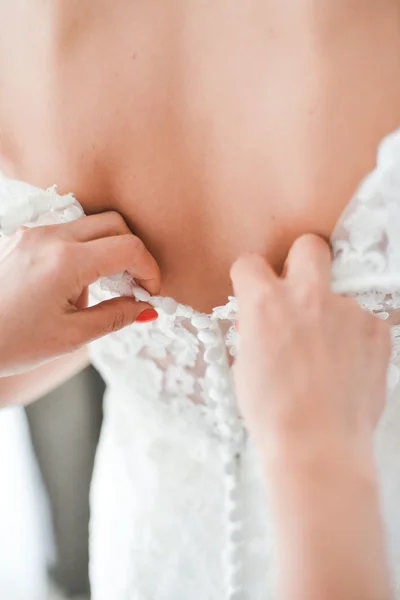 Garter on the leg of a bride, Wedding day moments