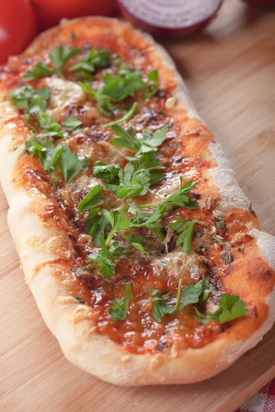 Plain pizza with tomato sauce and herbs