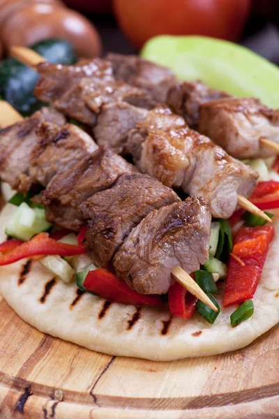 Pita bread and meat skewer