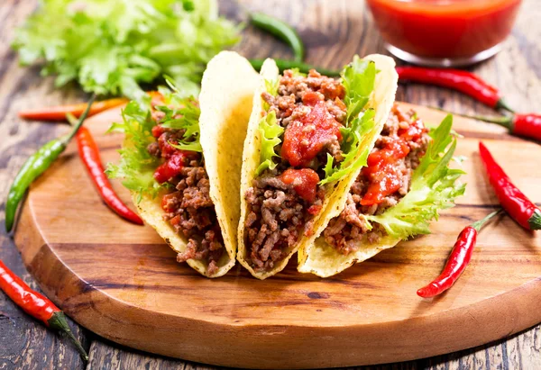 Mexican tacos with meat and  salsa