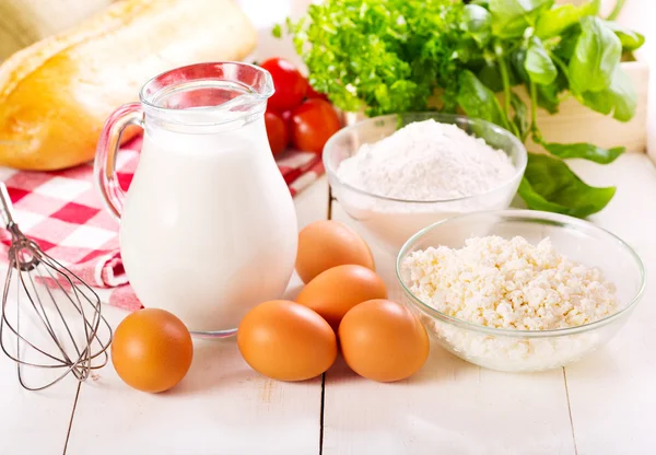 Raw eggs, milk, cottage cheese and flour