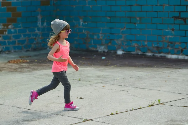 Hipster girl running away